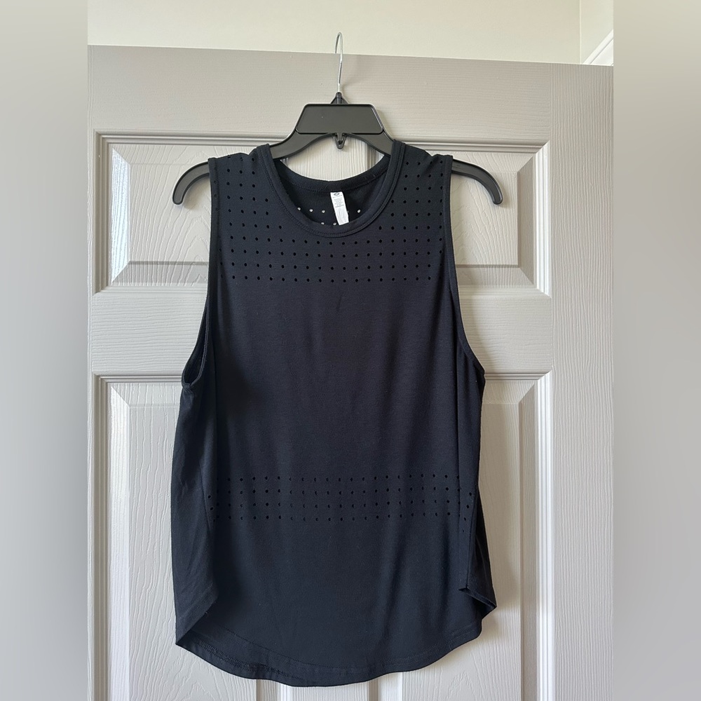 Glyder Muscle Tank with cute hole pattern.